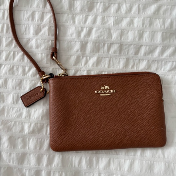 Coach Handbags - Coach Leather Wristlet in Chestnut Brown with Gold Hardware